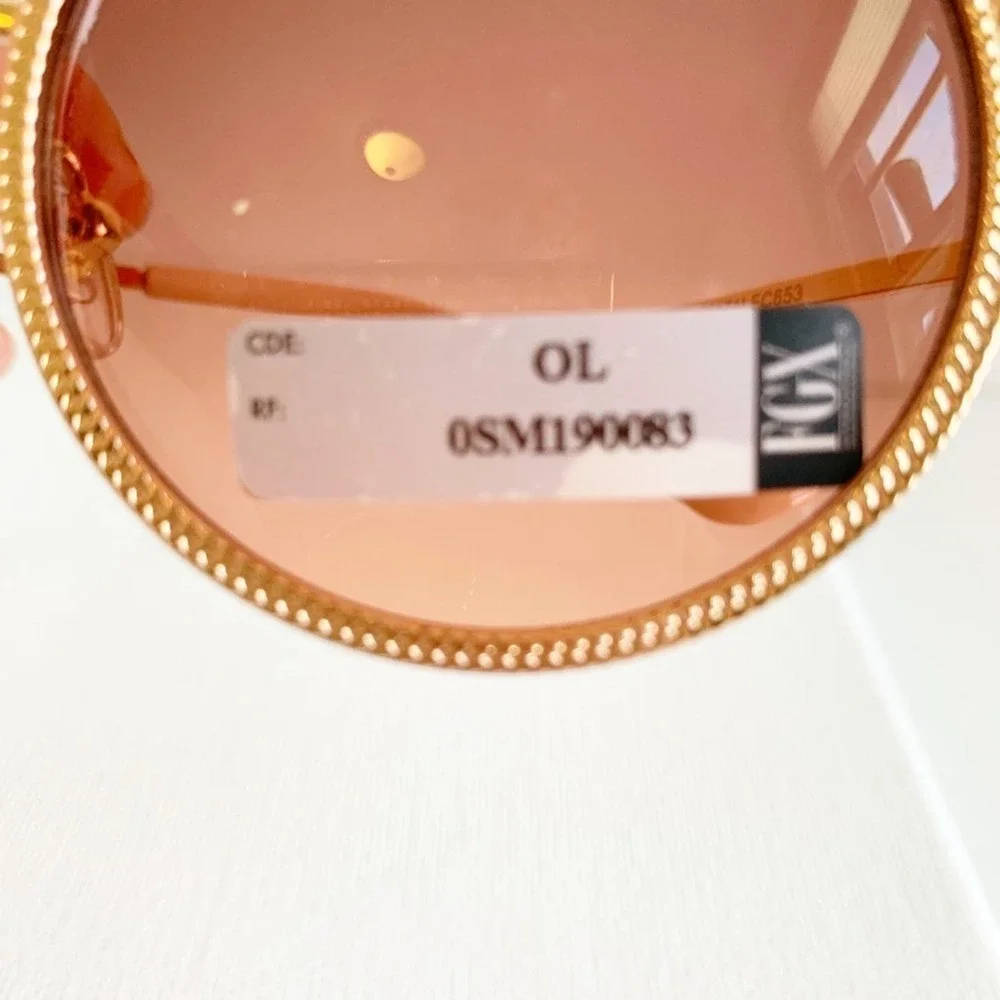 New with tage FGX rose gold round sunglasses